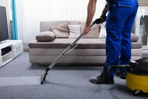 Janitor Cleaning Carpet | McSwain Carpet & Floors